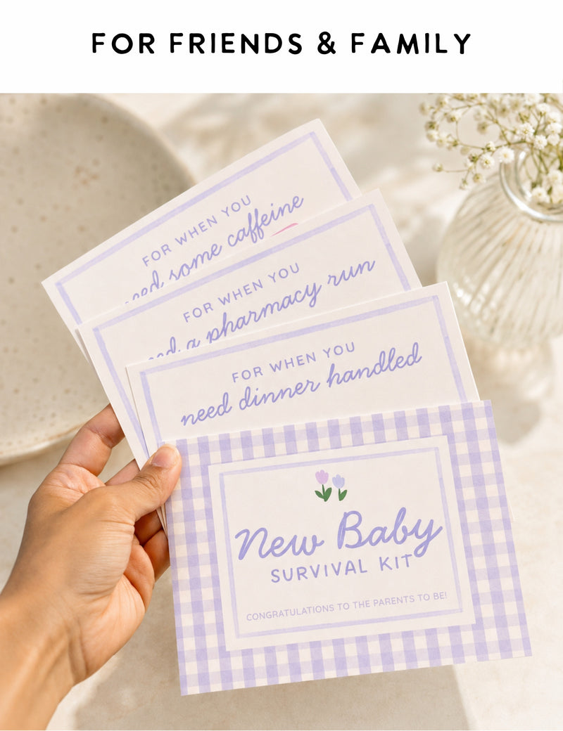 Hand holding a 'New Baby Survival Kit' card with a gingham design and text. Gift card holder for new parents