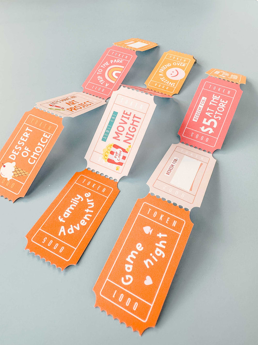 Kids birthday activity coupon box with mini ticket-style coupons.
